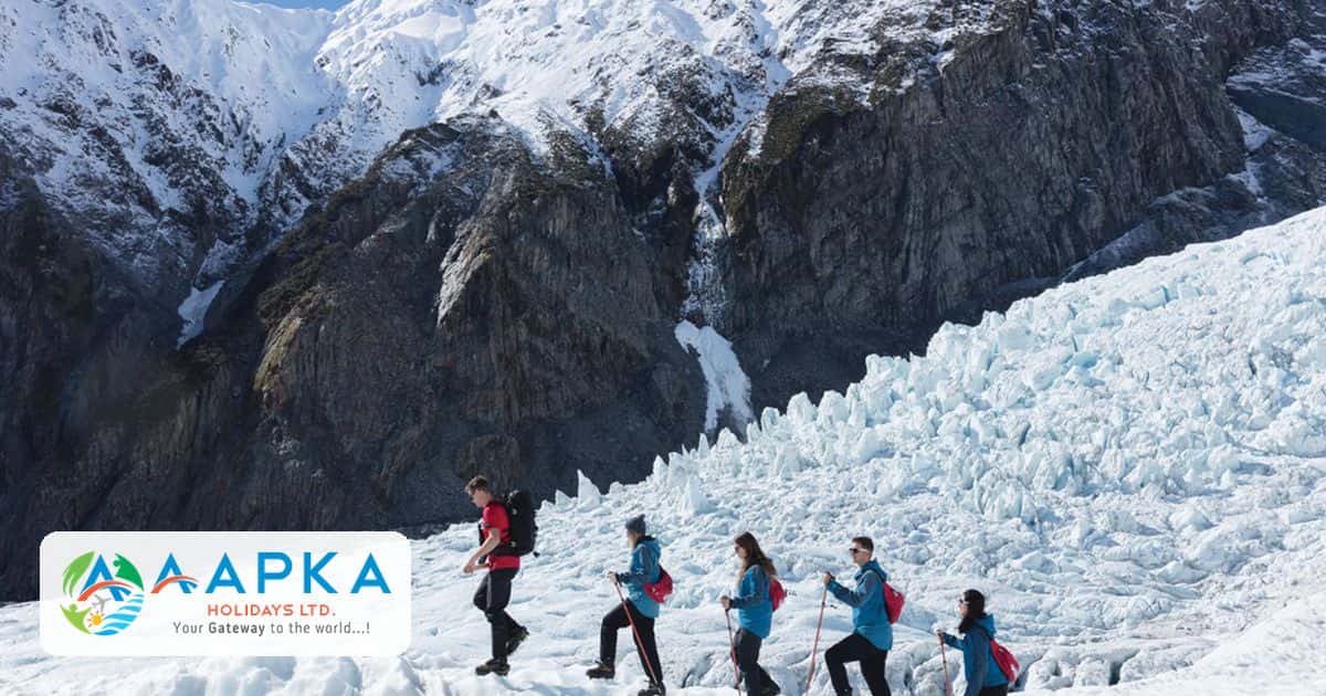 Hikers on Franz Josef Glacier in New Zealand, travel insurance for adventure trips